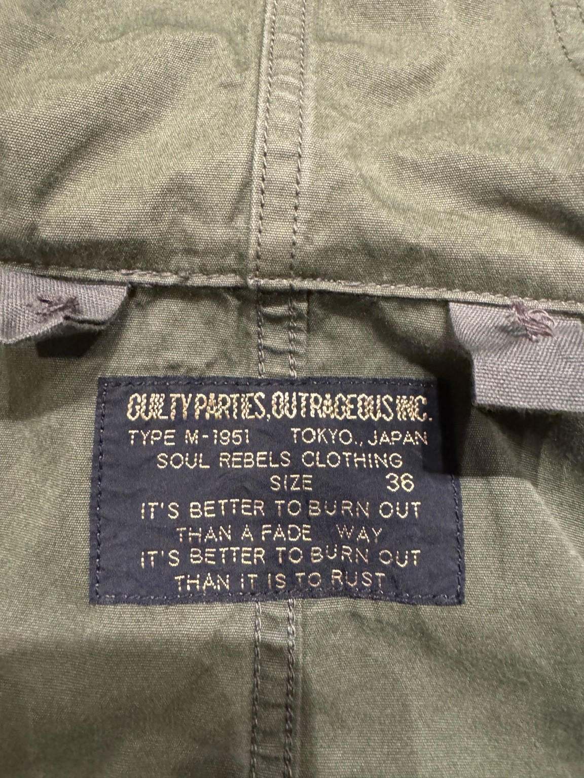 WACKO MARIA 初期GUILTY PARTIESタグのアップ。日本製M-51モッズコートのディテール。